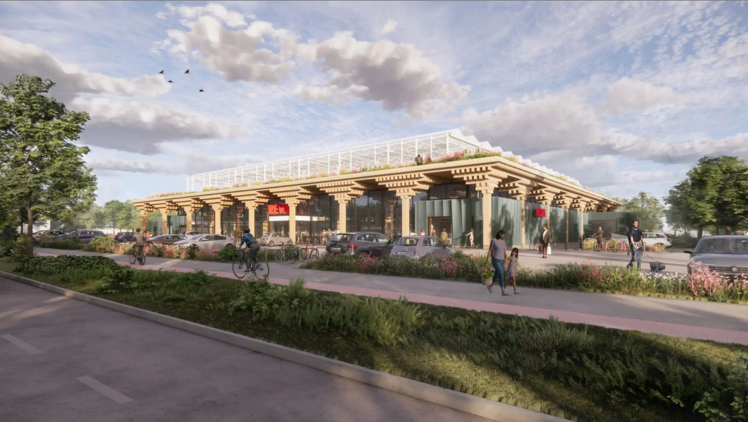 Die gläserne Dachfarm und die modulare Holzbauweise mit einem Tragwerk aus massiven Stützen ist charakteristisch für das Green Building bei REWE. Bild: REWE.